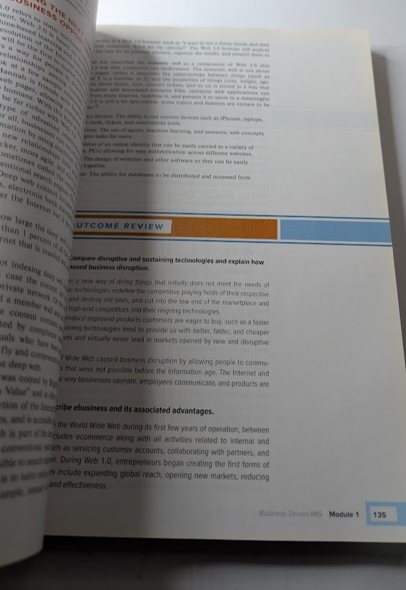 Business Driven Information Systems by Paige Baltzan