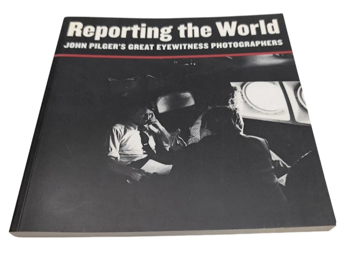 Reporting the World: John Pilger's Great Eyewitness Photographers, 2001 paperback, copy photograph 1